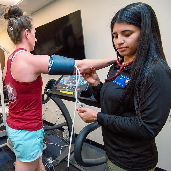 Student checking another students pulse